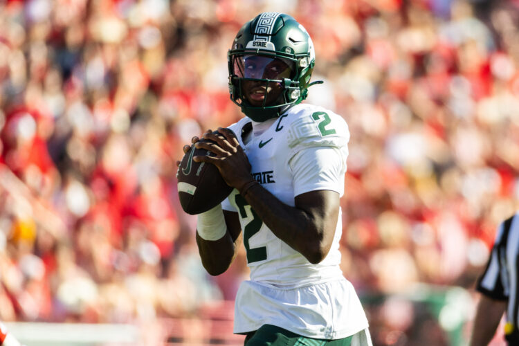 Nebraska breaks away from the Spartans late to win 38